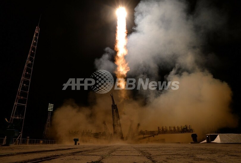 宇宙からソチ冬季五輪の聖火リレー、飛行士がISSに到着