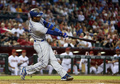 13MLBは19日、各地で試合が行われ、ロサンゼルス・ドジャース（Los Angeles Dodgers）は7-6でアリゾナ・ダイヤモンドバックス（Arizona Diamondbacks）を下し、プレーオフ進出一番乗りを果たした。

3回に3点本塁打を放つドジャースのヘンリー・ラミレス（Hanley Ramirez、2013年9月19日撮影）。(c)AFP/Getty Images/Christian Petersen