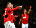 イングランド、FAカップ2012-13（FA Cup 2012-13）は26日、4回戦が行われ、マンチェスター・ユナイテッド（Manchester United）は4-1でフラム（Fulham）を下し、5回戦に進出した。

得点を挙げチームメイトのハビエル・エルナンデス（Javier Hernandez、中央）と喜ぶ、ウェイン・ルーニー（Wayne Rooney、左、2013年1月26日撮影）。(c)AFP/ANDREW YATES