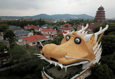 中国の「最も裕福な村」 崩れる成功神話を支える共産党