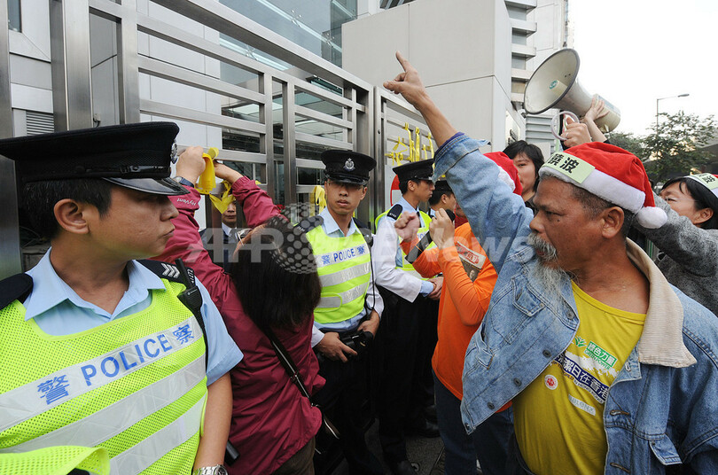 中国の改革訴えた人権活動家に懲役11年、「08憲章」起草の劉暁波氏
