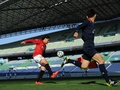 Jリーグ1部（J1）第4節、浦和レッドダイヤモンズ（Urawa Red Diamonds）対清水エスパルス（Shimizu S-Pulse）。無観客のスタジアムで試合に臨む浦和レッズの選手（2014年3月23日撮影）。(c)AFP/TOSHIFUMI KITAMURA