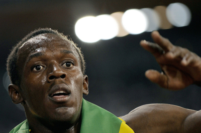 ボルト パウエルを抑えて100メートルで優勝