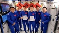 宇宙ステーション内の桂海潮飛行士（左から1人目、中国有人宇宙事業弁公室のビデオからのスクリーンショット、2023年6月9日提供）。(c)CGTN Japanese