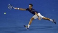 全豪オープンテニス、男子シングルス決勝。リターンを狙うノバク・ジョコビッチ（2016年1月31日撮影）。(c)AFP/SAEED KHAN