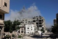 イスラエル軍の攻撃を受けるパレスチナ自治区ガザ地区のガザ市（2024年7月7日撮影）。(c)Omar AL-QATTAA / AFP
