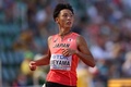 第18回世界陸上オレゴン大会、男子200メートル予選に臨む上山紘輝（2022年7月18日撮影）。(c)Patrick Smith/Getty Images/AFP
