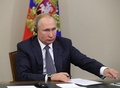ロシア・ソチで、映像を通して天然ガスパイプラインの稼働開始式典に臨むウラジーミル・プーチン大統領（2019年12月2日撮影）。(c)AFP/KLIMENTYEV / SPUTNIK / AFP
