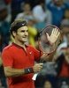 男子テニス、上海マスターズ（2014 Shanghai Rolex Masters）シングルス準決勝。勝利を喜ぶロジャー・フェデラー（Roger Federer、2014年10月11日撮影）。(c)AFP/GOH CHAI HIN