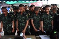 タイの首都バンコクの投票所で、票を投じる兵士ら（2019年3月24日撮影）。(c)AFP/Lillian SUWANRUMPHA