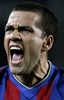 09-10スペイン1部リーグ第24節、FCバルセロナ（%%FC Barcelona%%）対マラガ（%%Malaga CF%%）。試合はバルセロナが2-1で勝利した。写真は後半38分にリオネル・メッシ（%%Lionel Messi%%）が挙げた決勝点に歓喜するFCバルセロナのダニエル・アルヴェス（%%Daniel Alves%%）。（2010年2月27日撮影）(c)AFP/JOSEP LAGO