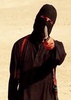 イスラム過激派組織「イスラム国」が公開した動画に写る「ジハーディ（聖戦士）ジョン」と呼ばれる覆面の男（2014年9月2日取得）。(c)AFP/HO/SITE INTELLIGENCE GROUP