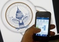 米首都ワシントンで撮影されたiPhoneの画面（2013年1月14日撮影、資料写真）。(c)AFP/SAUL LOEB
