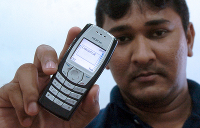 不在着信を利用した秘密のメッセージで、電話会社の収益減 - スリランカ