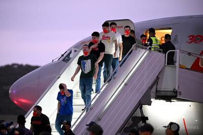 米追放ベネズエラ人移民を送還、交換で米国人10人も帰国