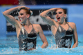 第15回世界水泳選手権（15th FINA World Championships）は21日、スペイン・バルセロナ（Barcelona）でシンクロナイズドスイミングのデュエット・テクニカルルーティン（TR）が行われ、ロシアのスベトラナ・ロマシナ（Svetlana Romashina）／スベトラナ・コレスニチェンコ（Svetlana Kolesnichenko）組が優勝した。

デュエットTR決勝の演技に臨むロシアのスベトラナ・ロマシナ／スベトラナ・コレスニチェンコ組（2013年7月21日撮影）。(c)AFP/JAVIER SORIANO