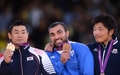 ロンドン五輪は1日、エクセル（ExCeL London）で柔道男子90キロ級3位決定戦が行われ、日本の西山将士（Masashi Nishiyama）はロシアのキリル・デニソフ（Kirill Denisov）を判定の末に退け、銅メダルを獲得した。

表彰式に臨む（左から）金メダルの宋大男（Song Dae-Nam、ソン・デナム）、銅メダルのイリアス・イリアディス（Ilias Iliadis、左）と西山将士（Masashi Nishiyama、2012年8月1日撮影）。(c)AFP/FRANCK FIFE