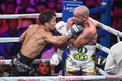 'Monster' Inoue stops injured Doheny to retain titles