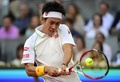 テニス、マドリード・オープン（Mutua Madrid Open 2014）男子シングルス決勝。リターンを打つ錦織圭（Kei Nishikori、2014年5月11日撮影）。(c)AFP/PIERRE-PHILIPPE MARCOU