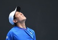 全豪オープンテニス、男子シングルス1回戦。ポイントを失って悔しがる西岡良仁（2017年1月17日撮影）。(c)AFP/SAEED KHAN