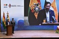 ボリビアの政府所在地ラパスで開かれた調印式で演説するルイス・アルセ大統領（2023年6月29日撮影）。(c)AIZAR RALDES / AFP