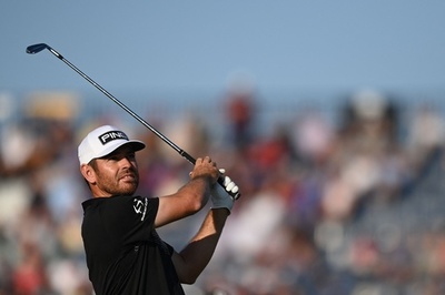 ウーストハイゼン、36Hの大会最少スコアで首位維持 全英OP