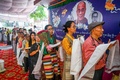インドの首都ニューデリーで、ダライ・ラマ14世の87歳の誕生日を祝う会場に並ぶ亡命チベット人（2022年7月6日撮影）。(c)Prakash SINGH / AFP