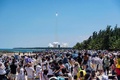 中国南部・海南省の文昌衛星発射センターから、独自に建設中の宇宙ステーションに連結する二つ目の実験棟「問天」を搭載して打ち上げられたロケット（2022年7月24日撮影）。(c)CNS / AFP