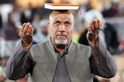 【今日の1枚】聖典を頭に捧げる祈り イラク