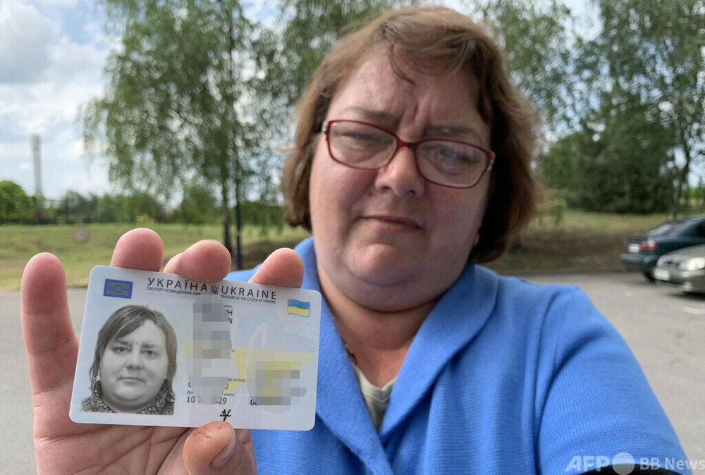 ロシア占領地で強制されるパスポート取得 ウクライナ 写真8枚 国際
