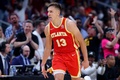 21-22NBAプレーオフ、イースタンカンファレンス1回戦、アトランタ・ホークス対マイアミ・ヒート。得点を喜ぶアトランタ・ホークスのボグダン・ボグダノビッチ（2022年4月22日撮影）。(c)Kevin C. Cox/Getty Images/AFP