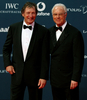 ローレウス・ワールド・スポーツ・アワード（%%2010 Laureus World Sports Awards%%）の授賞式が10日、アラブ首長国連邦のアブダビ（Abu Dhabi）で開催され、男子年間最優秀選手には陸上競技のウサイン・ボルト（%%Usain Bolt%%、ジャマイカ）、女子年間最優秀選手にはテニスのセレーナ・ウィリアムス（%%Serena Williams%%、米国）が選出された。ボルトの受賞は2年連続2度目。

　写真は友人と授賞式に出席したドイツの伝説的サッカー選手フランツ・ベッケンバウアー（%%Franz Beckenbauer%%）氏（右）。（2010年3月10日撮影）(c)AFP/MARWAN NAAMANI