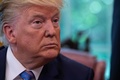 米ホワイトハウスの執務室で、記者団に話をするドナルド・トランプ大統領（2019年7月1日撮影）。(c)NICHOLAS KAMM / AFP