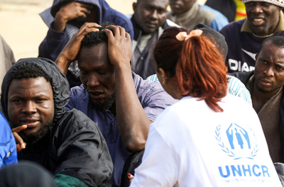 リビアで人身売買業者が国連職員になりすまし、移民を虐待か