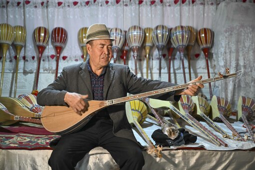 村に響き渡る民族楽器の音色 中国新疆ウイグル自治区 写真20枚 国際ニュース：AFPBB News