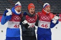 平昌冬季五輪、スキージャンプ男子ノーマルヒル決勝の表彰式に臨むロバート・ヨハンソン、アンドレアス・ウェリンガー、ヨハン・アンドレ・フォーファング（2018年2月10日撮影）。(c)AFP PHOTO / Christof STACHE