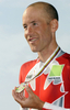 2008UCIロード世界選手権エリート男子タイムトライアルの表彰式に臨むSvein Tuft。（2008年9月25日撮影）(c)AFP/DAMIEN MEYER
