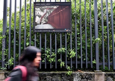 国境の壁がテーマ、メキシコの大学でAFPカメラマンチームの写真展