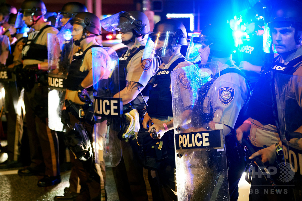 米司法省がファーガソン市を提訴、黒人射殺めぐる警察改革拒否で 米司法省がファーガソン市を提訴、黒人射殺めぐる警察改革拒否で