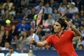 男子テニス、上海マスターズ（2014 Shanghai Rolex Masters）シングルス準決勝。リターンを狙うロジャー・フェデラー（Roger Federer、2014年10月11日撮影）。(c)AFP/GOH CHAI HIN