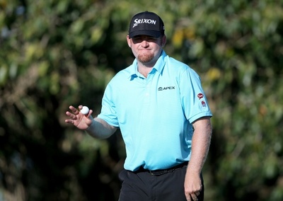 ホームズがコースタイ記録で単独首位発進、キャデラック選手権