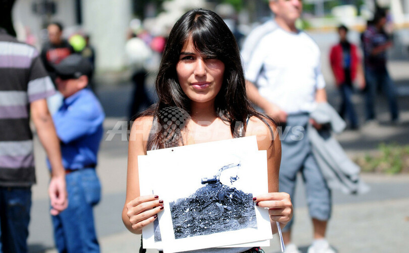 チリ大地震・津波から1年、被災地で追悼式典 進まぬ復興