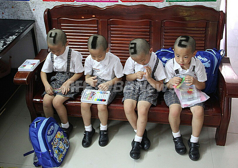 ツルツルの1年生 頭に番号 中国の四つ子 写真2枚 国際ニュース Afpbb News