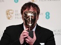 英国アカデミー賞（British Academy Film Awards）で、脚本賞を受賞したクエンティン・タランティーノ（Quentin Tarantino、2013年2月10日撮影）。(c)AFP/Carl COURT
