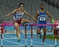 第17回アジア競技大会（17th Asian Games、Asiad）陸上男子400メートルハードル決勝のレースに臨む岸本鷹幸（Takayuki Kishimoto、2014年10月1日撮影）。(c)AFP/MANAN VATSYAYANA