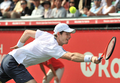 男子テニス、楽天ジャパンオープン（Rakuten Japan Open Tennis Championships 2012）は6日、東京の有明コロシアム（Ariake Coliseum）でシングルス準決勝が行われ、大会第1シードのアンディ・マレー（Andy Murray、英国）は3-6、7-6、6-7で第6シードのミロス・ラオニッチ（Milos Raonic、カナダ）に敗れた。

リターンを打つアンディ・マレー（2012年10月6日撮影）。(c)AFP/KAZUHIRO NOGI