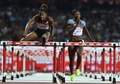陸上、ダイヤモンドリーグ第10戦ロンドン大会、女子100メートルハードル決勝。レースに臨むケンドラ・ハリソン（左、2016年7月22日撮影）。(c)AFP/Ben STANSALL