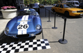 元レーシングドライバーでレーシングカーデザイナーのキャロル・シェルビー（Carroll Shelby）氏がつくった伝説のレーシングカー「シェルビー・コブラ・デイトナクーペ（Shelby Daytona Cobra Coupe CSX260）」が、オークションに出品されるのを前にニューヨーク（New York）の老舗ホテル、プラザホテル（Plaza Hotel）前に展示された。

　シェルビー・コブラ・デイトナクーペは6台のみ製造され、1965年に米国産レースカーとして初めて「国際マニュファクチャラーズ選手権（現在のスポーツカー世界選手権）」でフェラーリ（Ferrari）に勝利した。

　オークションは5月15日に米インディアナ（Indiana）州インディアナポリス（Indianapolis）で開催され、自動車の史上最高価格となる推計1000-1500万ドル（約10-15億円）の値段がつくとみられている（2009年4月28日撮影）。(c)AFP/Emmanuel Dunand