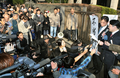 写真は13日、東京高裁前で判決について記者会見する原告団側弁護人の泉澤章弁護士。(c)AFP/Kazuhiro NOGI
