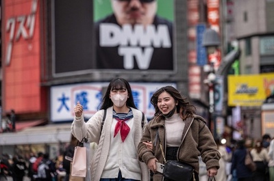 Japan eases mask guidelines, but few are keen to change
